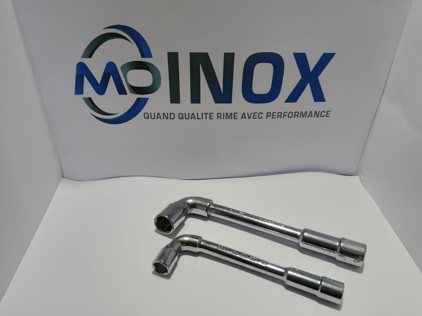 Poignée inox coudée